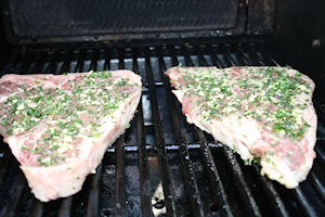 porterhouse-grill Place the steaks on the grill.