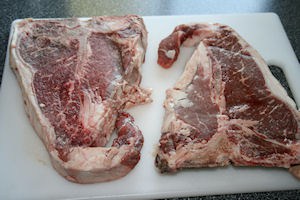 raw-porterhouse Patiently resting steaks.
