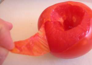 Peel tomatoes - 5 - start where you cut out the core