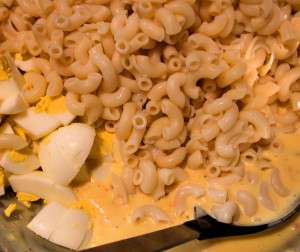 Classic Macaroni Salad - fold eggs and macaroni into dressing Gently, gently