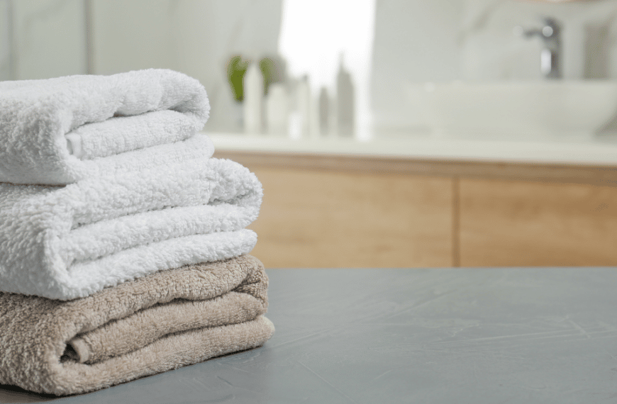 folded towels sitting on counter