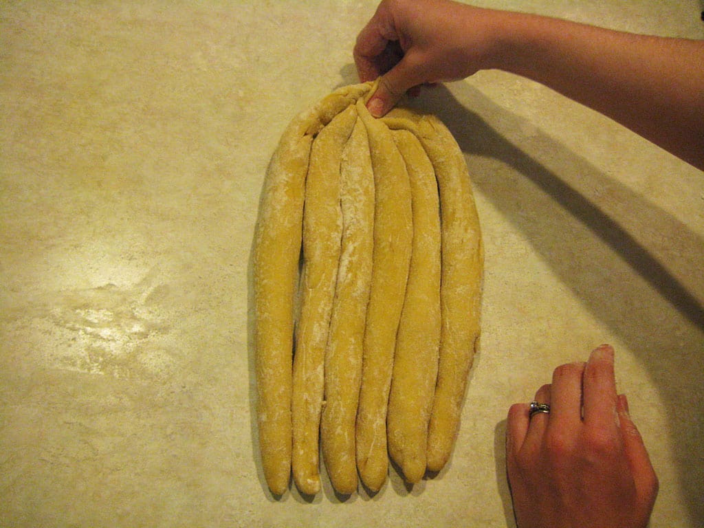 Strands of challah dough prepared for braiding