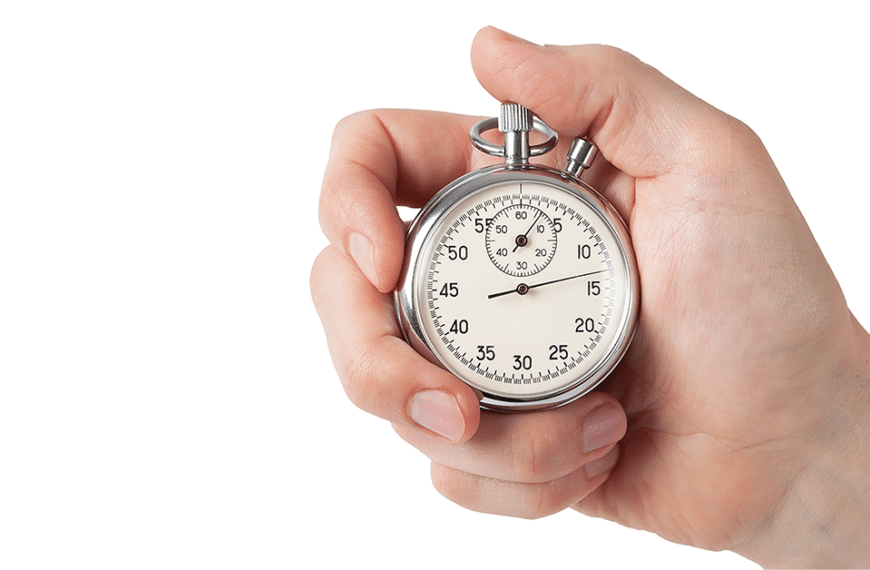 Hand holding a stopwatch